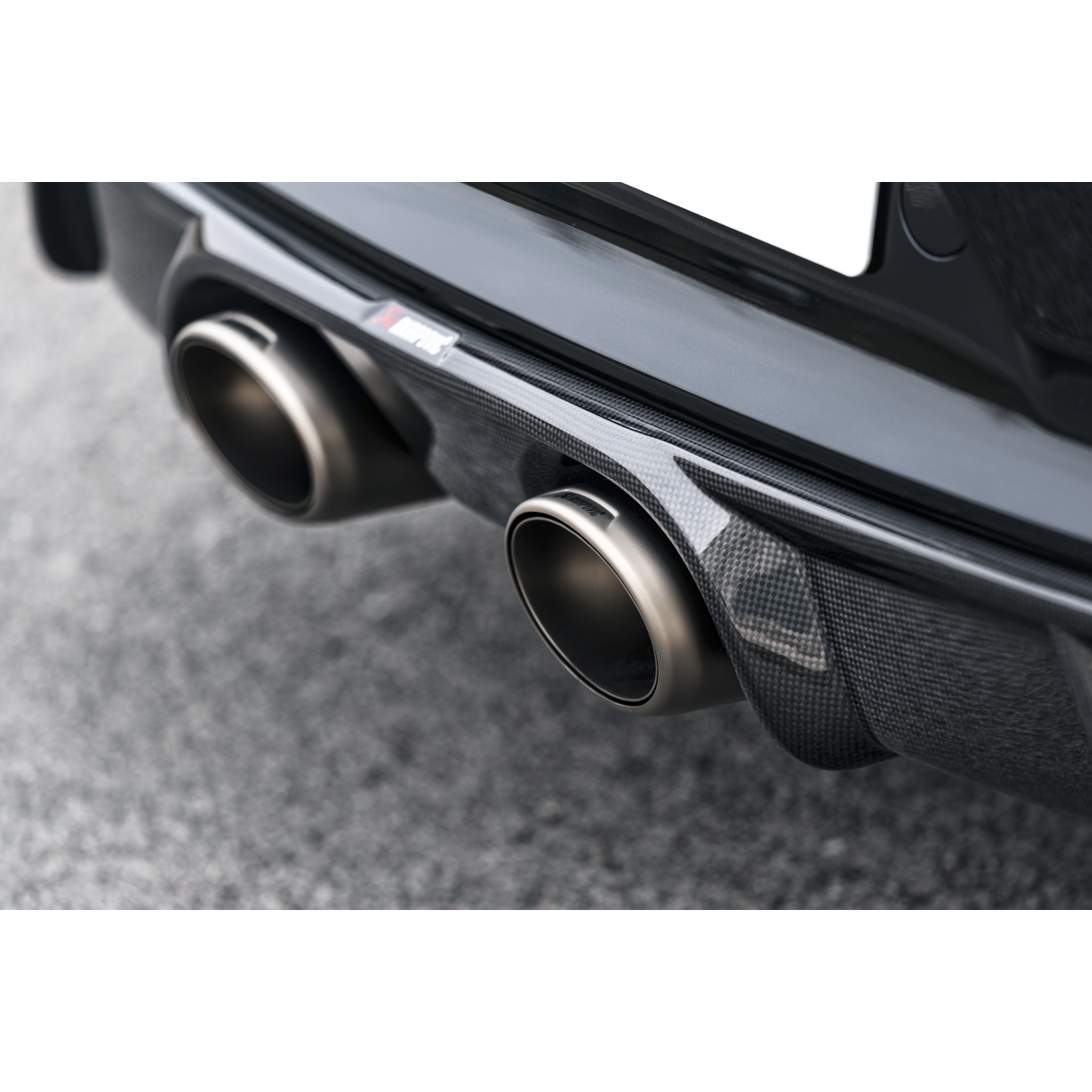 Akrapovič High Gloss Rear Carbon Fiber Diffuser - 2016-2019 Porsche 911 Carrera S/4/4S/GTS (991.2) - T1 Motorsports